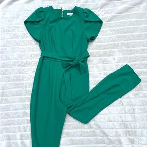 Calvin Klein green jumper. Gold zipper, pockets, fabric belt, full length.